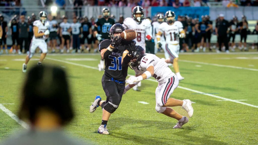 Lawrence football vs. Olathe Northwest, Week 3-8