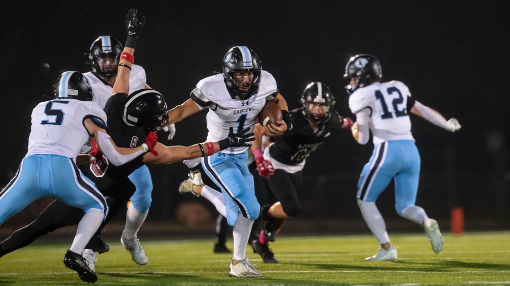 Lawrence High football vs. Shawnee MIssion East, Week 5-32