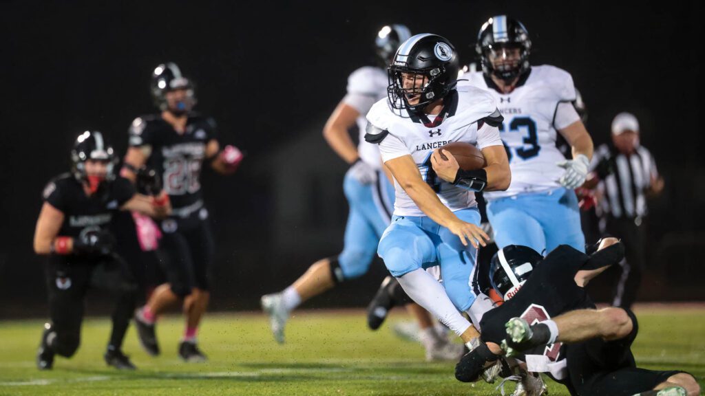 Lawrence High football vs. Shawnee MIssion East, Week 5-33
