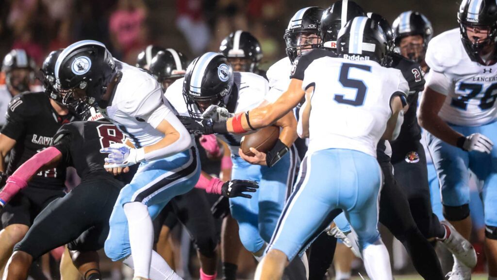 Lawrence High football vs. Shawnee MIssion East, Week 5-36