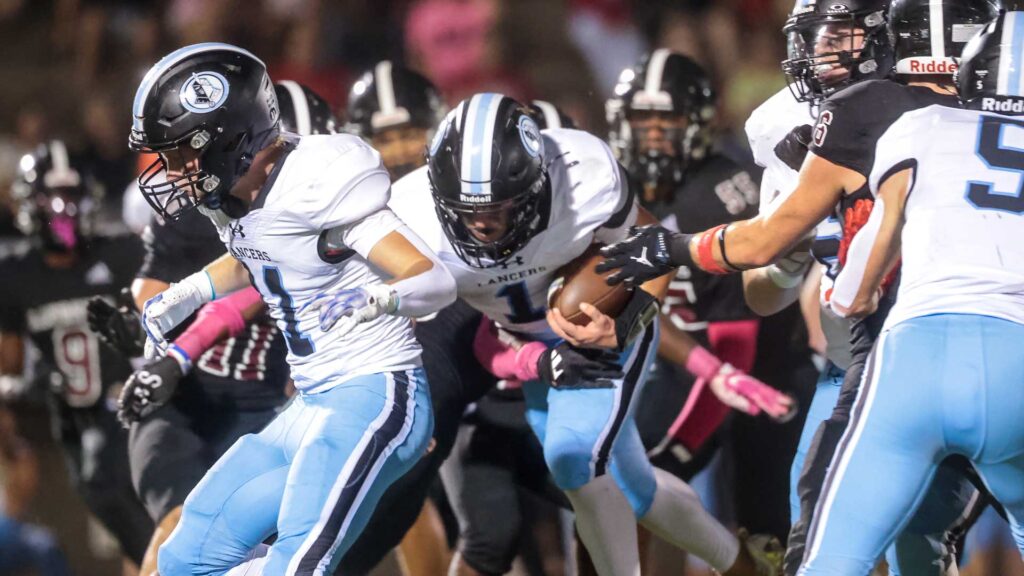 Lawrence High football vs. Shawnee MIssion East, Week 5-37