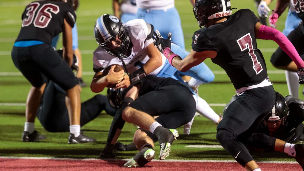 Lawrence High football vs. Shawnee MIssion East, Week 5-42