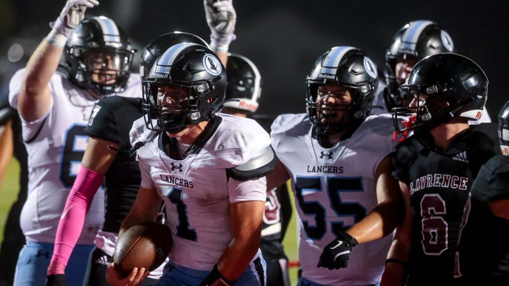 Lawrence High football vs. Shawnee MIssion East, Week 5-44