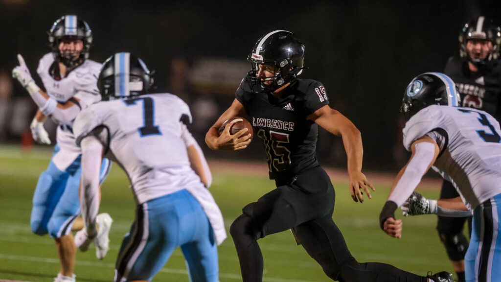 Lawrence High football vs. Shawnee MIssion East, Week 5-52