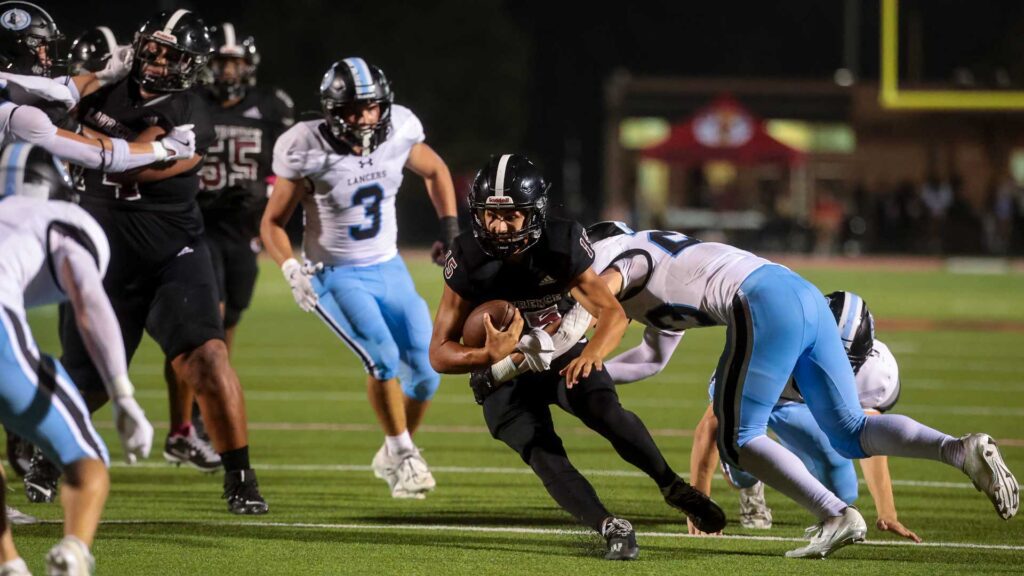 Lawrence High football vs. Shawnee MIssion East, Week 5-53
