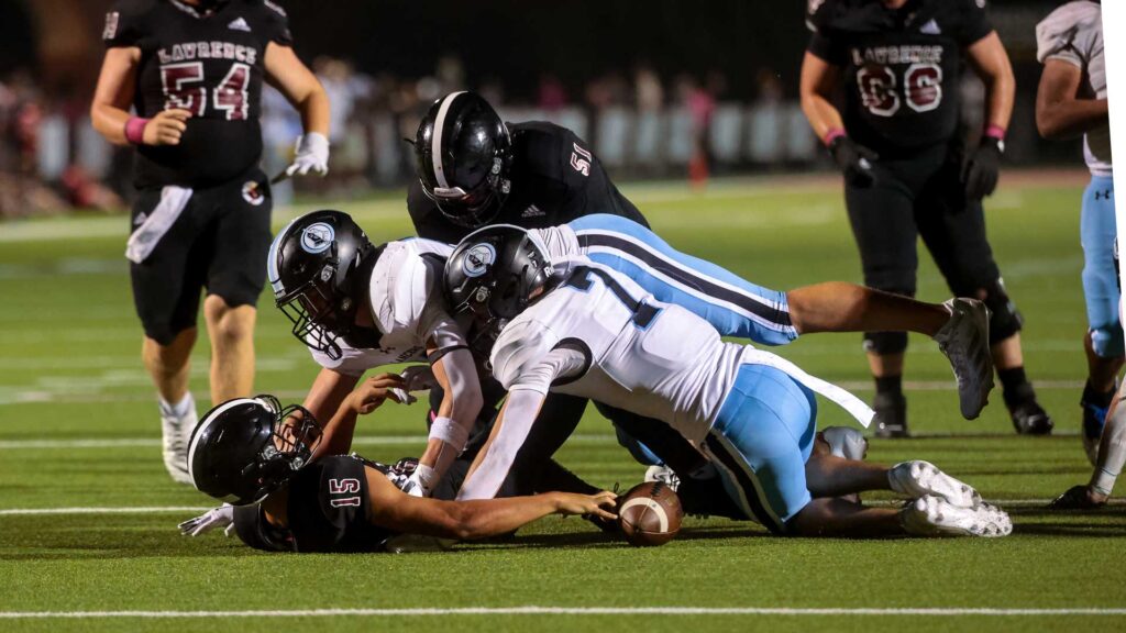 Lawrence High football vs. Shawnee MIssion East, Week 5-54