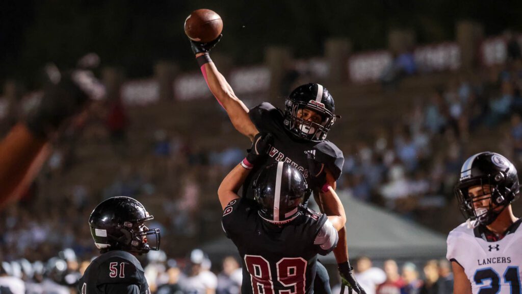 Lawrence High football vs. Shawnee MIssion East, Week 5-61