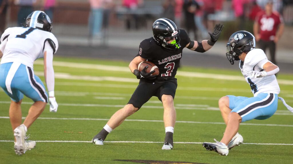 Lawrence High football vs. Shawnee MIssion East, Week 5-8