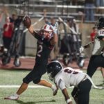 Lawrence High allows 2-score lead to slip away, loses 29-28 in OT  against Shawnee Mission North