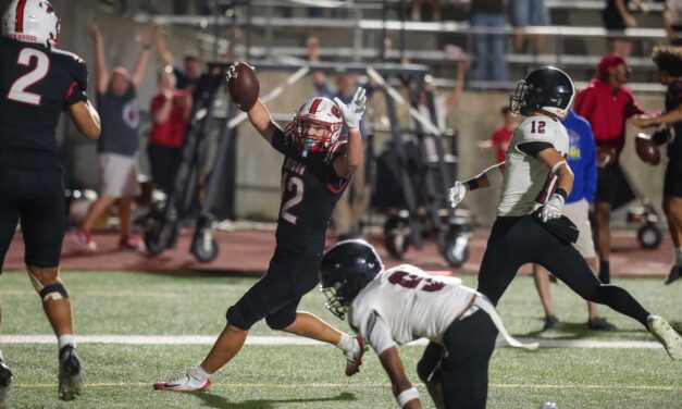 Lawrence High allows 2-score lead to slip away, loses 29-28 in OT  against Shawnee Mission North