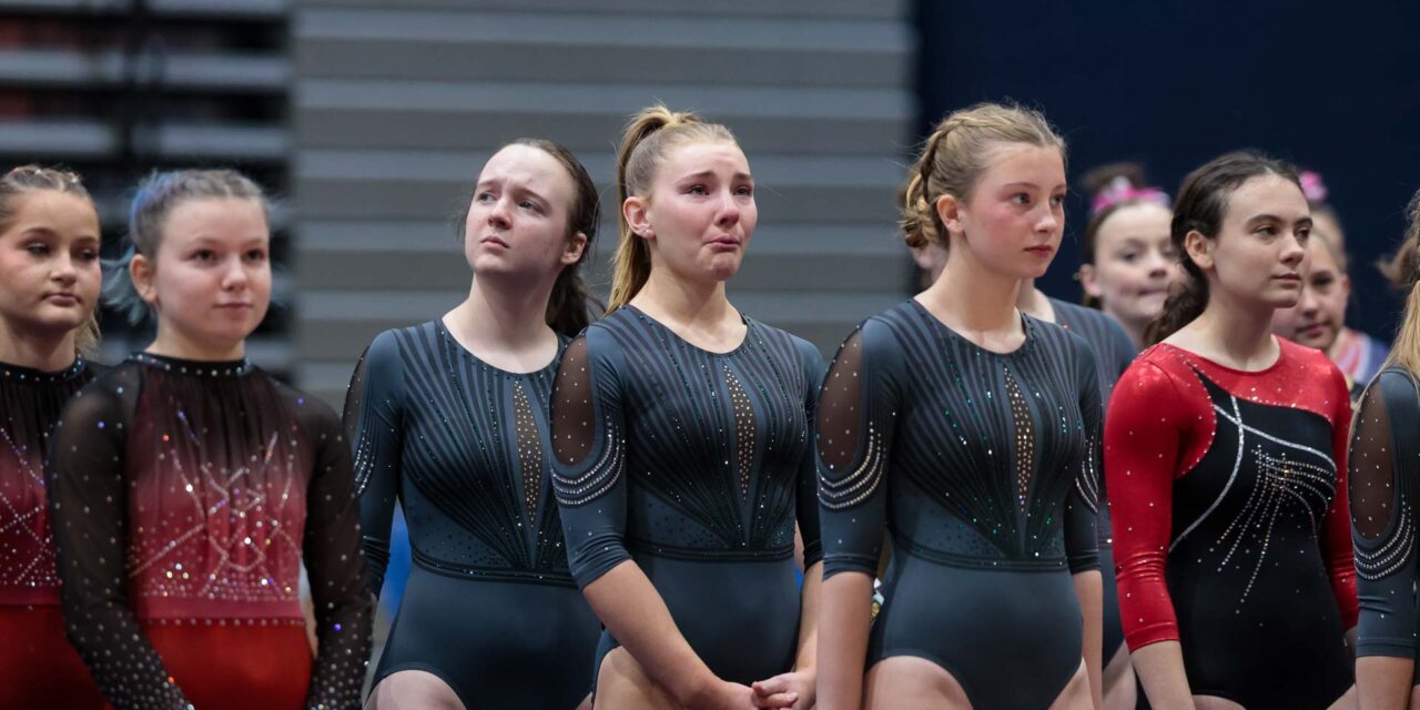 Lawrence high school gymnasts compete in emotional final meet; Sunflower League ends program