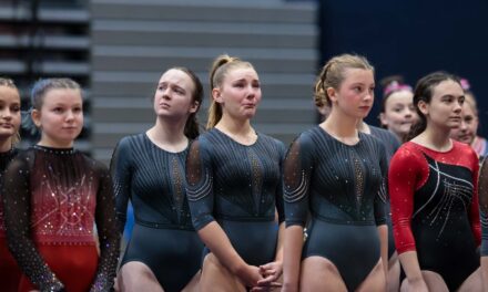 Lawrence high school gymnasts compete in emotional final meet; Sunflower League ends program