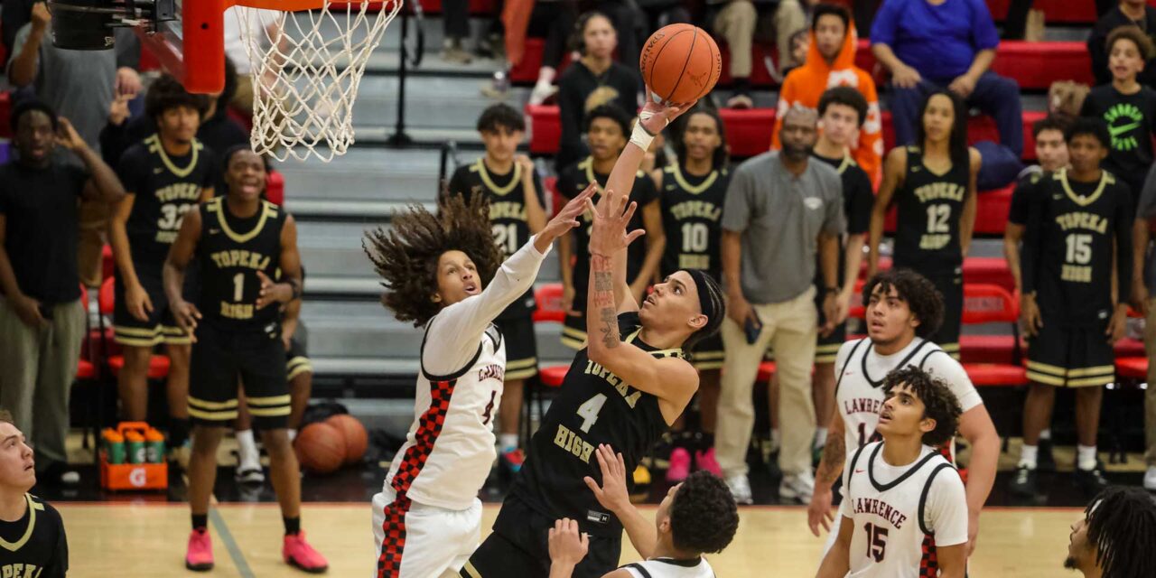 Lawrence High boys relinquish late lead, fall to Topeka High in 66-65 thriller